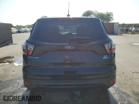 2018 Ford Escape SE z VIN 1FMCU9GD5JUB84551, wystawiony jako Copart lot #54515495 z przebiegiem 73 280 mil mil oraz Szkoda całkowita • Salvage title. Historia ofert i sprzedaży dostępna na DreamBid. Obrazek 6.