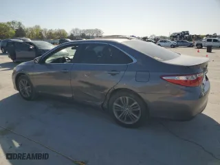 2015 Toyota Camry Hybrid LE with VIN 4T1BD1FKXFU163408, listed as a Copart auction lot 52046565 with 99,570 mi miles and Salvage Title. Bid and sale history available at carsss.com. Image 2.