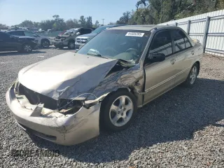 2002 Mazda Protege DX with VIN JM1BJ225X21610009, listed as a Copart auction lot 44505265 with Not Provided miles and Salvage Title. Bid and sale history available at DreamBid. Image 1.