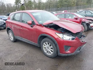 2013 Mazda CX-5 Sport with VIN JM3KE2BE0D0148709, listed as a IAAI auction lot 41958515 with 100,938 mi miles and . Bid and sale history available at DreamBid. Image 1.