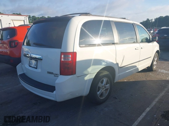 2010 Dodge Grand Caravan SXT z VIN 2D4RN5D10AR200217, wystawiony jako IAAI lot #42540925 z przebiegiem 239 247 mil mil oraz . Historia ofert i sprzedaży dostępna na DreamBid. Obrazek 4.