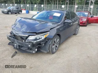 2016 Kia Optima SX Turbo z VIN 5XXGW4L28GG010897, wystawiony jako IAAI lot #42703779 z przebiegiem 121 918 mil mil oraz . Historia ofert i sprzedaży dostępna na DreamBid. Obrazek 19.