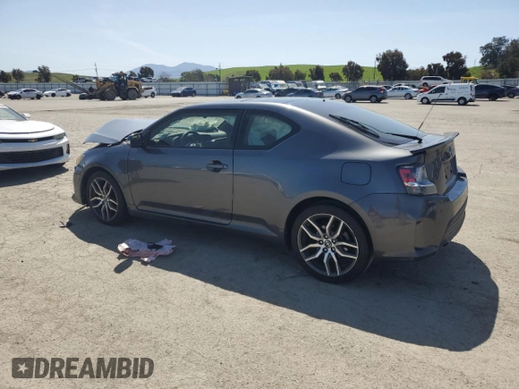 2014 Scion tC with VIN JTKJF5C7XE3085579, listed as a Copart auction lot 52431165 with 44,421 mi miles and Salvage Title. Bid and sale history available at carsss.com. Image 2.