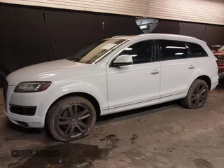 2013 Audi Q7 Premium Plus with VIN WA1LGAFE1DD009705, listed as a IAAI auction lot 41390712 with 99,649 mi miles and . Bid and sale history available at DreamBid. Image 2.