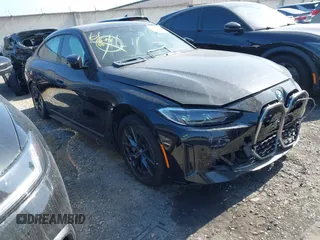 2023 BMW i4 eDrive40 z VIN WBY73AW03PFR16924, wystawiony jako IAAI lot #42034635 z przebiegiem 15 136 mil mil oraz . Historia ofert i sprzedaży dostępna na DreamBid. Obrazek 1.