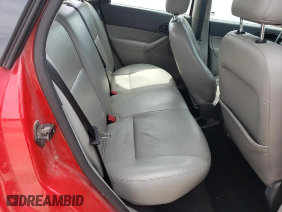 2007 Ford Focus S z VIN 1FAHP37N47W245222, wystawiony jako Copart lot #57293025 z przebiegiem 102 552 mil mil oraz Szkoda całkowita • Salvage title. Historia ofert i sprzedaży dostępna na DreamBid. Obrazek 10.