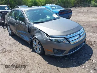 2012 Ford Fusion SE z VIN 3FAHP0HA5CR253997, wystawiony jako IAAI lot #41989525 z przebiegiem 153 643 mil mil oraz . Historia ofert i sprzedaży dostępna na DreamBid. Obrazek 1.