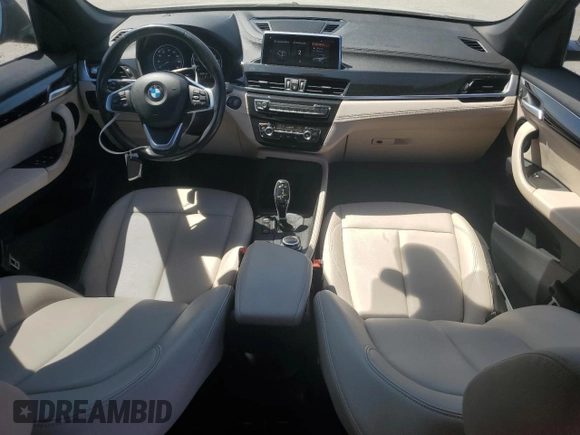 2021 BMW X1 xDrive28i z VIN WBXJG9C07M5S73464, wystawiony jako Copart lot #50374525 z przebiegiem 117 828 mil mil oraz Tytuł czysty. Historia ofert i sprzedaży dostępna na DreamBid. Obrazek 8.