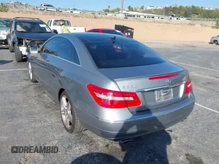2013 Mercedes-Benz E 350 with VIN WDDKJ5KB4DF182716, listed as a IAAI auction lot 41543021 with 106,094 mi miles and . Bid and sale history available at DreamBid. Image 3.
