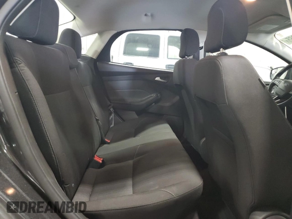 2018 Ford Focus SE z VIN 1FADP3FE4JL289830, wystawiony jako Copart lot #53350265 z przebiegiem 72 963 mil mil oraz Szkoda całkowita • Salvage title. Historia ofert i sprzedaży dostępna na DreamBid. Obrazek 10.
