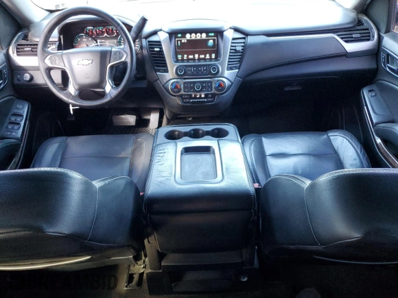 2017 Chevrolet Suburban LS with VIN 1GNSCGECXHR351539, listed as a Copart auction lot 87070214 with 246,129 mi miles and Salvage title. Bid and sale history available at DreamBid. Image 8.
