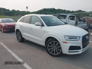 2018 Audi Q3 Premium Plus z VIN WA1JCCFS9JR026173, wystawiony jako IAAI lot #42391407 z przebiegiem 69 288 mil mil oraz . Historia ofert i sprzedaży dostępna na DreamBid. Obrazek 1.