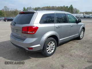 2015 Dodge Journey SXT with VIN 3C4PDDBG4FT554643, listed as a IAAI auction lot 42172378 with 144,924 mi miles and . Bid and sale history available at DreamBid. Image 4.
