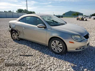 2009 Volkswagen Eos Komfort с VIN WVWAA71F99V016050, выставлен на аукционе Copart как лот 58229565 с пробегом 105 584 миль миль и Списание • Salvage title. История ставок и продаж доступна на DreamBid. Изображение 4.