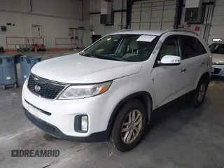 2015 Kia Sorento LX with VIN 5XYKTDA75FG653090, listed as a IAAI auction lot 42676355 with 153,476 mi miles and . Bid and sale history available at DreamBid. Image 2.