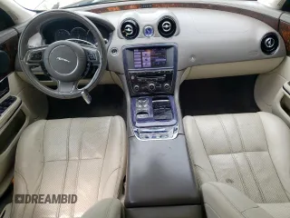2013 Jaguar XJ with VIN SAJWA1C77D8V41738, listed as a Copart auction lot 53796225 with 104,063 mi miles and Salvage Title. Bid and sale history available at DreamBid. Image 8.