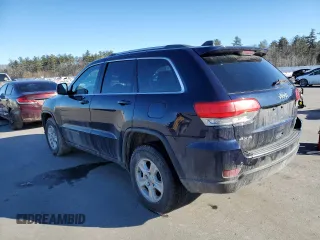 2017 Jeep Grand Cherokee Laredo with VIN 1C4RJFAG9HC609830, listed as a Copart auction lot 47599295 with 136,014 mi miles and Salvage title. Bid and sale history available at DreamBid. Image 2.