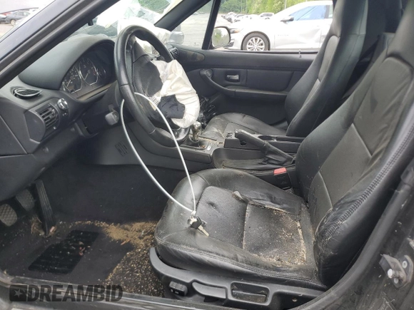 2000 BMW Z3 2.5 z VIN 4USCH9342YLF85373, wystawiony jako Copart lot #56733025 z przebiegiem Nie podano mil oraz Szkoda całkowita • Salvage title. Historia ofert i sprzedaży dostępna na DreamBid. Obrazek 7.