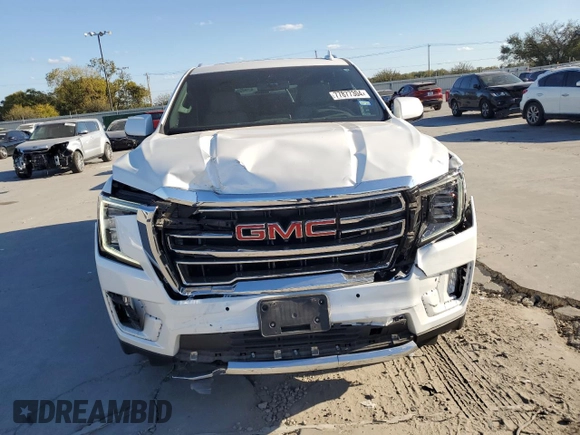 2022 GMC Yukon SLT with VIN 1GKS1BKD1NR259041, listed as a Copart auction lot 77877304 with 27,772 mi miles and Salvage Title. Bid and sale history available at carsss.com. Image 5.