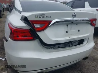 2016 Nissan Maxima S with VIN 1N4AA6AP2GC412533, listed as a IAAI auction lot 41831813 with 122,933 mi miles and . Bid and sale history available at DreamBid. Image 6.