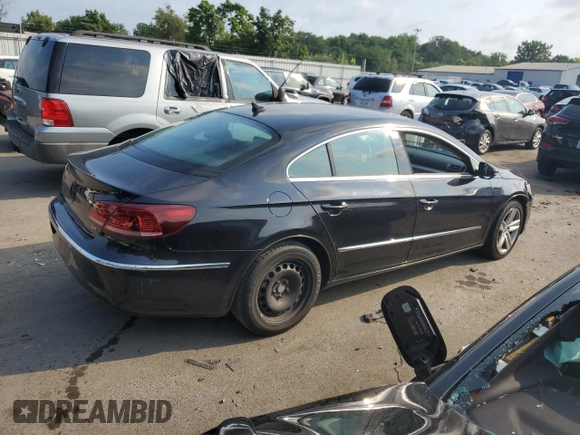 2014 Volkswagen CC R-Line with VIN WVWBP7AN2EE507967, listed as a Copart auction lot 65423594 with 121,212 mi miles and Salvage Title. Bid and sale history available at carsss.com. Image 3.