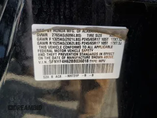 2011 Honda Pilot EX-L z VIN 5FNYF4H62BB036018, wystawiony jako Copart lot #58846165 z przebiegiem 199 116 mil mil oraz Szkoda całkowita • Salvage title. Historia ofert i sprzedaży dostępna na DreamBid. Obrazek 13.