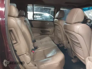 2009 Honda Pilot EX-L with VIN 5FNYF48569B021586, listed as a IAAI auction lot 41609721 with 291,598 mi miles. Bid and sale history available at carsss.com. Image 8.