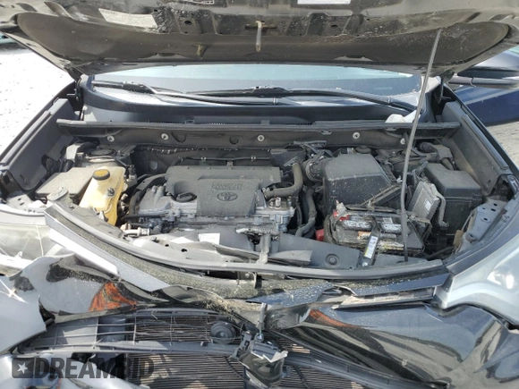 2018 Toyota RAV4 XLE with VIN 2T3WFREV2JW458816, listed as a Copart auction lot 53235105 with 135,469 mi miles and Salvage Title. Bid and sale history available at DreamBid. Image 12.