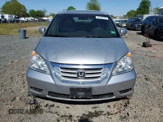 2010 Honda Odyssey EX-L with VIN 5FNRL3H76AB114542, listed as a Copart auction lot 54785425 with 104,239 mi miles and Salvage Title. Bid and sale history available at DreamBid. Image 5.