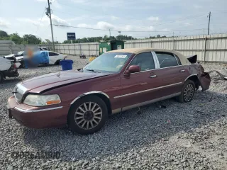 2004 Lincoln Town Car Signature z VIN 1LNHM81W54Y686970, wystawiony jako Copart lot #55615565 z przebiegiem 1 644 925 mil mil oraz Szkoda całkowita • Salvage title. Historia ofert i sprzedaży dostępna na DreamBid. Obrazek 1.