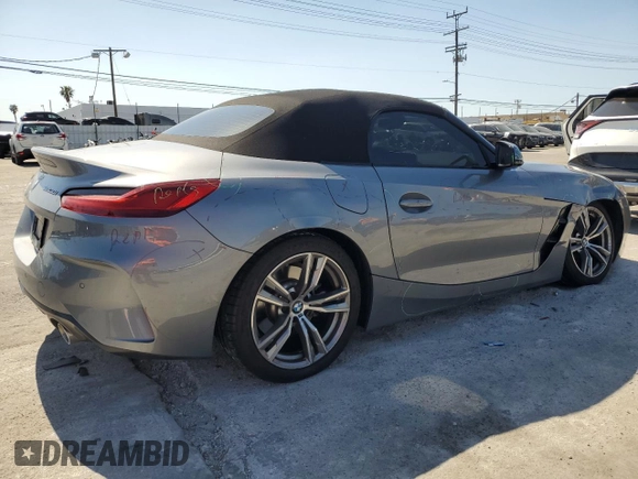 2024 BMW Z4 sDrive30i with VIN WBAHF3C06RWY36286, listed as a Copart auction lot 50296565 with 9,898 mi miles and Salvage title. Bid and sale history available at DreamBid. Image 3.