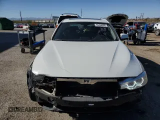 2013 BMW 3 Series 328i with VIN WBA3C1G51DNR47551, listed as a Copart auction lot 55408905 with 131,930 mi miles and Salvage Title. Bid and sale history available at DreamBid. Image 5.