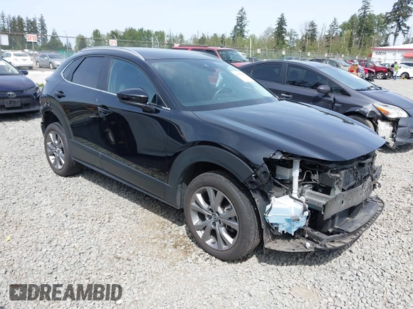 2023 Mazda CX-30 S Carbon Edition with VIN 3MVDMBCM3PM562447, listed as a IAAI auction lot 42174280 with 22,028 mi miles and . Bid and sale history available at DreamBid. Image 1.