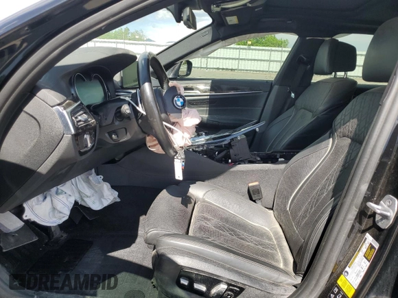 2018 BMW 5 Series M550i xDrive with VIN WBAJB9C55JB049384, listed as a Copart auction lot 54934435 with 79,061 mi miles and Non Repairable. Bid and sale history available at DreamBid. Image 7.