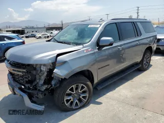 2022 Chevrolet Suburban Z71 with VIN 1GNSKDKDXNR331866, listed as a Copart auction lot 65722205 with 39,726 mi miles and Salvage title. Bid and sale history available at DreamBid. Image 1.