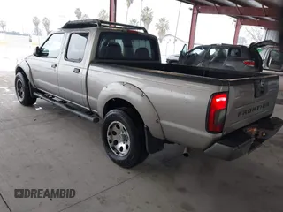 2003 Nissan Frontier SE z VIN 1N6ED29X73C438326, wystawiony jako IAAI lot #41437797 z przebiegiem 309 235 mil mil oraz . Historia ofert i sprzedaży dostępna na DreamBid. Obrazek 3.