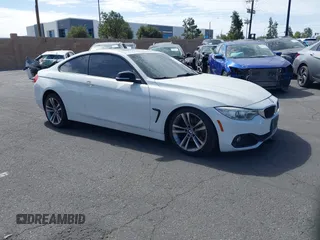 2015 BMW 4 Series 428i with VIN WBA3N7C51FK223575, listed as a IAAI auction lot 41524703 with 146,705 mi miles and . Bid and sale history available at carsss.com. Image 1.