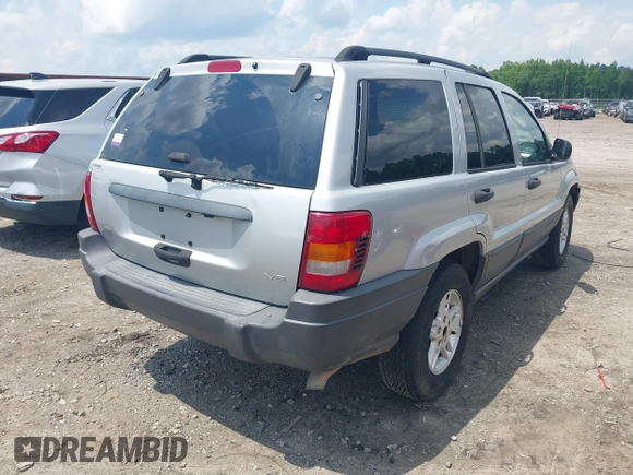 2004 Jeep Grand Cherokee Laredo with VIN 1J4GX48N04C435603, listed as a IAAI auction lot 42274197 with 256,163 mi miles and . Bid and sale history available at DreamBid. Image 4.