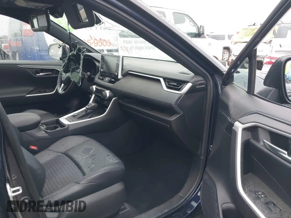 2021 Toyota RAV4 Hybrid XSE with VIN 2T3E6RFV5MW002856, listed as a IAAI auction lot 42387921 with Not provided miles and . Bid and sale history available at DreamBid. Image 5.