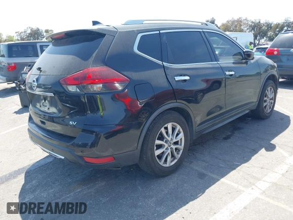 2019 Nissan Rogue SV with VIN KNMAT2MT8KP506083, listed as a IAAI auction lot 41965304 with 99,872 mi miles and . Bid and sale history available at DreamBid. Image 4.