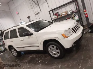 2010 Jeep Grand Cherokee Laredo with VIN 1J4PR4GK1AC143486, listed as a IAAI auction lot 41761763 with 159,139 mi miles. Bid and sale history available at carsss.com. Image 13.