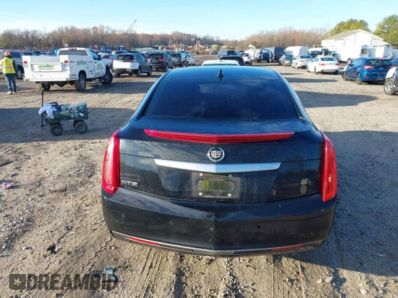 2013 Cadillac XTS z VIN 2G61N5S32D9238652, wystawiony jako IAAI lot #40966692 z przebiegiem 90 834 mil mil oraz . Historia ofert i sprzedaży dostępna na DreamBid. Obrazek 16.