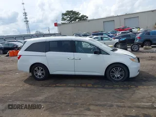 2011 Honda Odyssey EX-L with VIN 5FNRL5H67BB070541, listed as a IAAI auction lot 41812554 with 150,898 mi miles and . Bid and sale history available at DreamBid. Image 13.