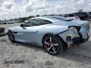 2023 Ferrari Portofino z VIN ZFF02RPA4P0298111, wystawiony jako Copart lot #65799704 z przebiegiem 1096 mil mil oraz Nie do naprawy. Historia ofert i sprzedaży dostępna na DreamBid. Obrazek 2.