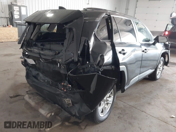 2020 Toyota RAV4 XLE with VIN 2T3P1RFV0LC079187, listed as a IAAI auction lot 42409656 with 68,881 mi miles and . Bid and sale history available at DreamBid. Image 4.