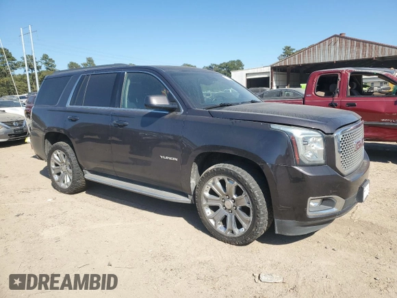 2015 GMC Yukon SLT with VIN 1GKS1BKC0FR239629, listed as a Copart auction lot 77414814 with 171,611 mi miles and Salvage Title. Bid and sale history available at carsss.com. Image 4.