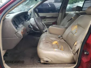 1999 Mercury Grand Marquis LS с VIN 2MEFM75W9XX701991, выставлен на аукционе Copart как лот 58388085 с пробегом 163 160 миль миль и Списание • Salvage title. История ставок и продаж доступна на DreamBid. Изображение 7.