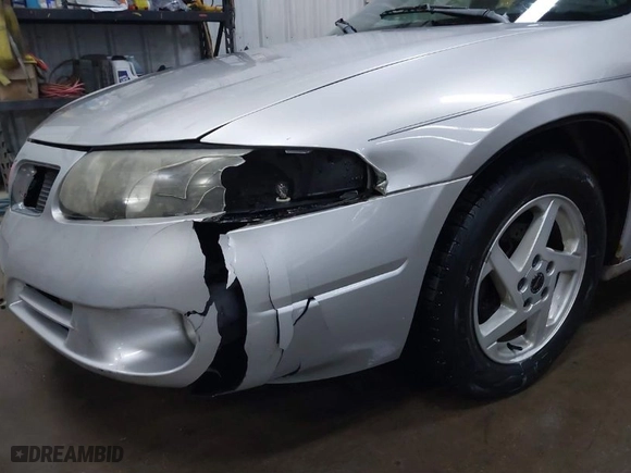 2003 Pontiac Bonneville SE with VIN 1G2HX52K734152756, listed as a IAAI auction lot 41482255 with 219,472 mi miles. Bid and sale history available at carsss.com. Image 6.