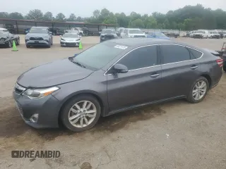 2014 Toyota Avalon Limited z VIN 4T1BK1EB1EU095375, wystawiony jako Copart lot #56521415 z przebiegiem 290 838 mil mil oraz Czysty tytuł • Clean title. Historia ofert i sprzedaży dostępna na DreamBid. Obrazek 1.