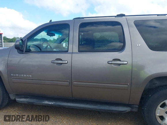 2011 Chevrolet Suburban LT with VIN 1GNSKJE37BR337895, listed as a IAAI auction lot 42171238 with 228,327 mi miles and . Bid and sale history available at DreamBid. Image 14.